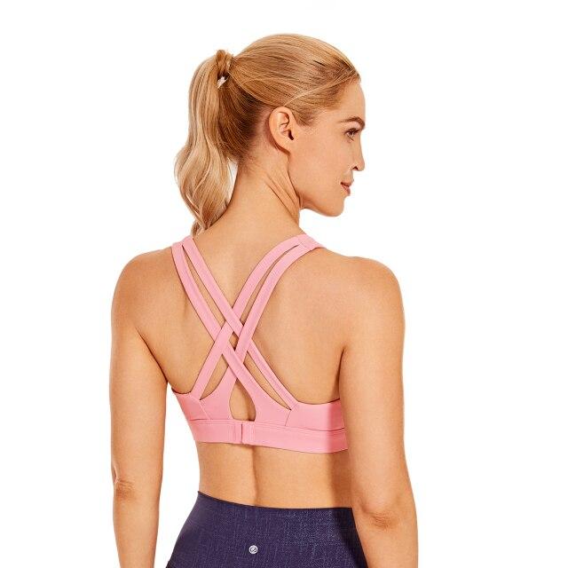 Women's Sexy Stappy Sports Bra featuring a stylish strappy back design, wireless padded support, and anti-sweat material, available in various sizes.
