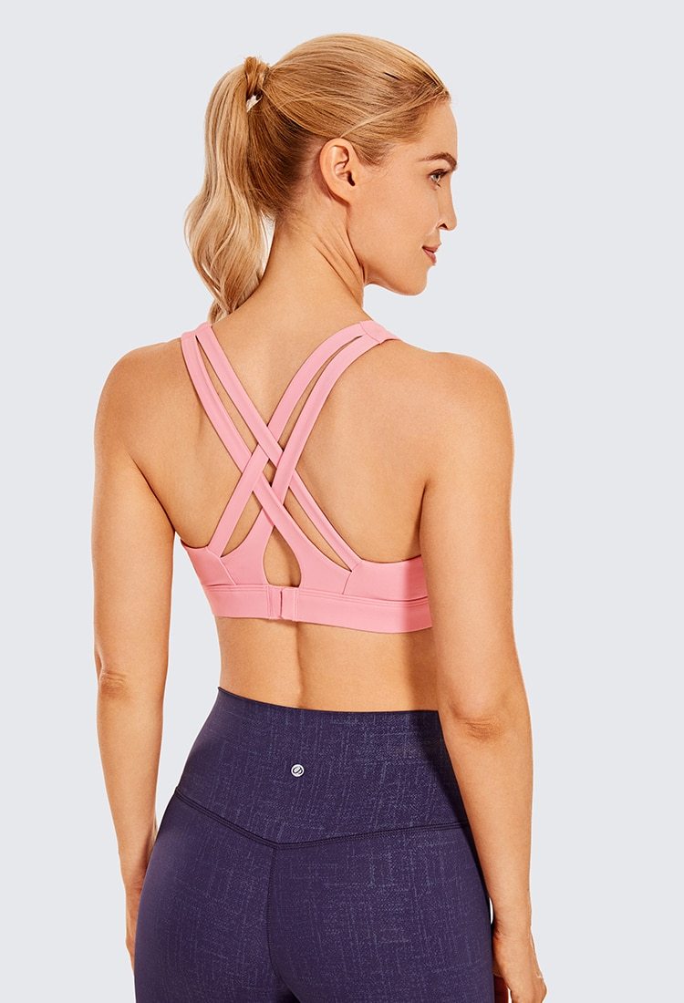 Women's Sexy Stappy Sports Bra featuring a stylish strappy back design, wireless padded support, and anti-sweat material, available in various sizes.