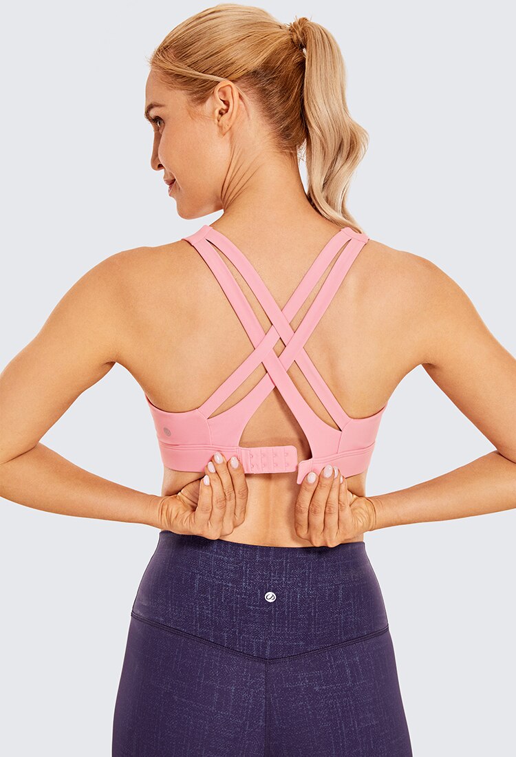 Women's Sexy Stappy Sports Bra featuring a stylish strappy back design, wireless padded support, and anti-sweat material, available in various sizes.