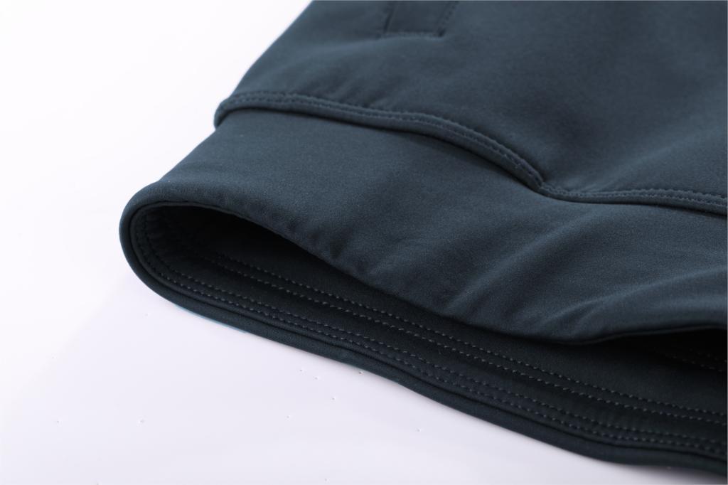 A pair of women's stretch casual jogger pants in black with a drawstring waist and zipper pockets, perfect for travel and lounging.