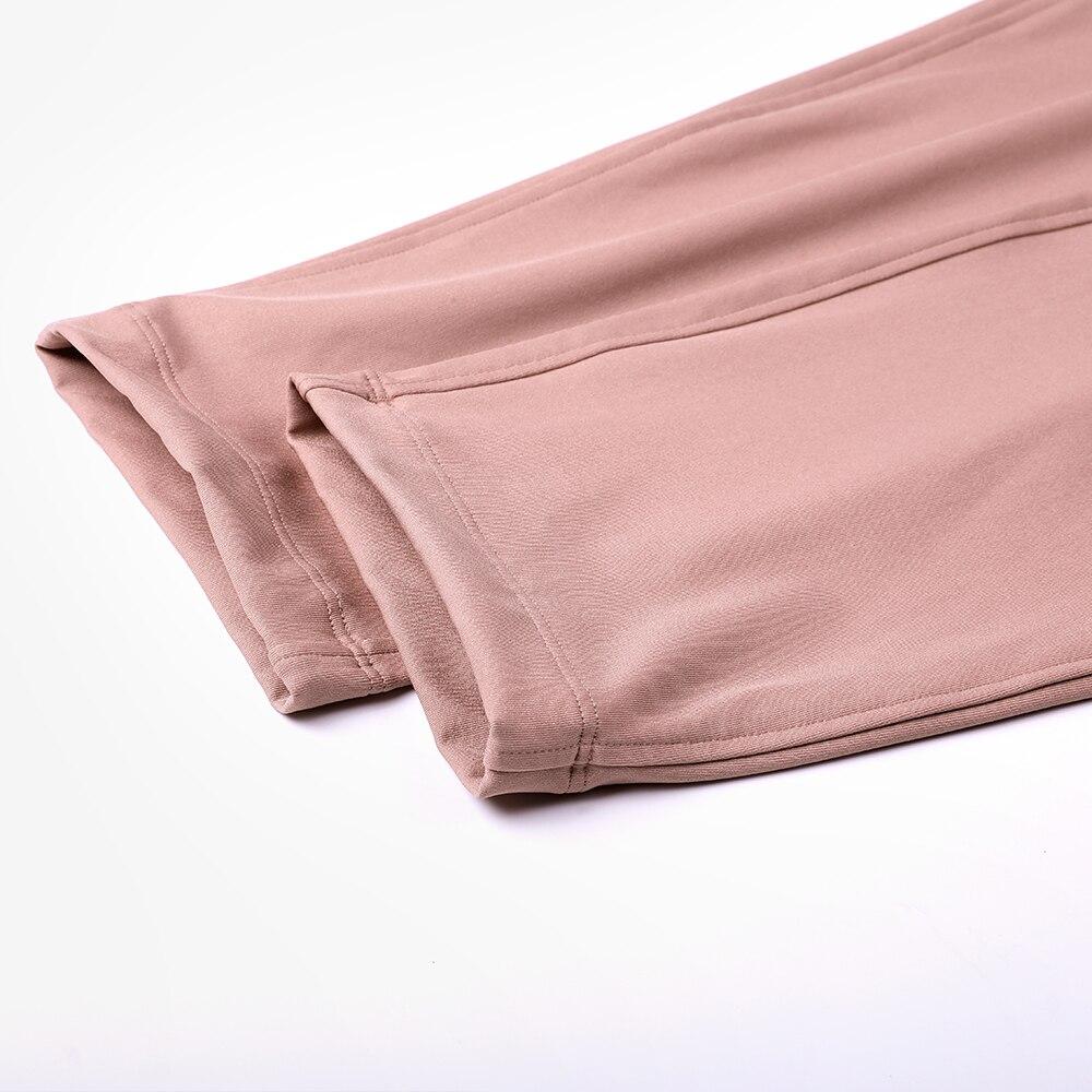 A pair of women's stretch lounge sweatpants in a stylish design, featuring a drawstring closure and pockets, perfect for travel and athletic training.