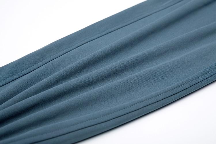 A pair of women's stretch lounge sweatpants in a stylish design, featuring a drawstring closure and pockets, perfect for travel and athletic training.