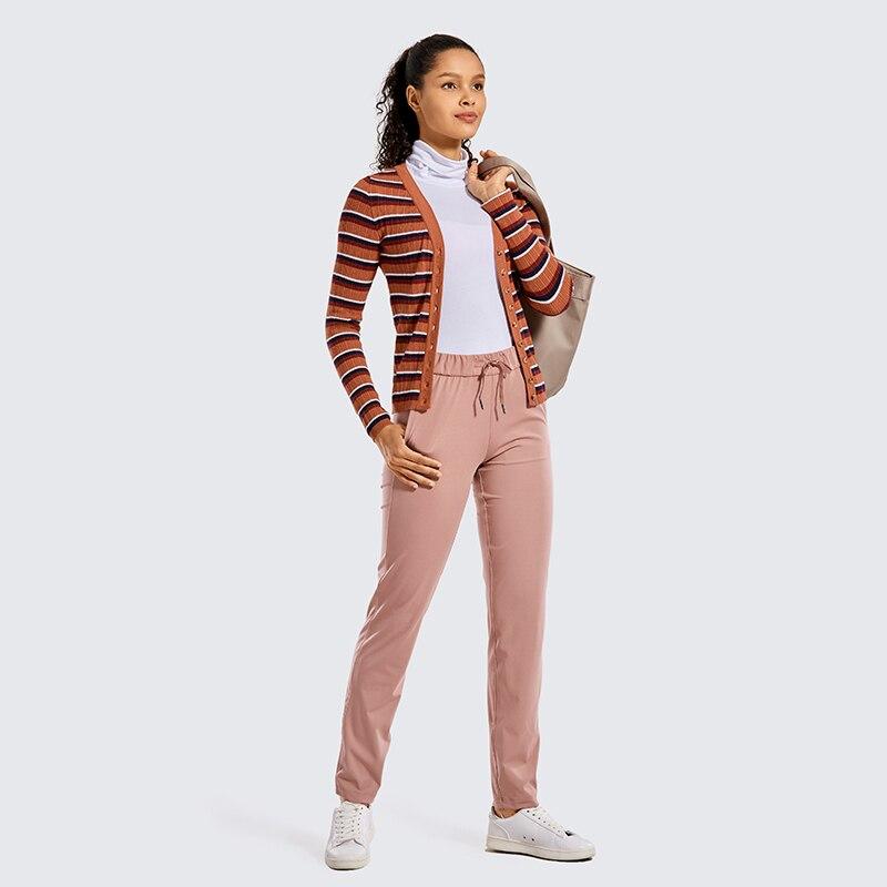 A pair of women's stretch lounge sweatpants in a stylish design, featuring a drawstring closure and pockets, perfect for travel and athletic training.