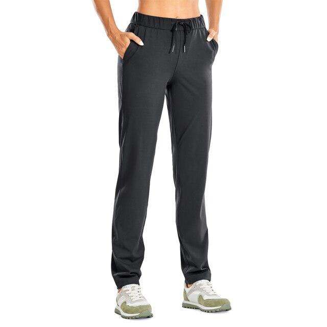 A pair of women's stretch lounge sweatpants in a stylish design, featuring a drawstring closure and pockets, perfect for travel and athletic training.