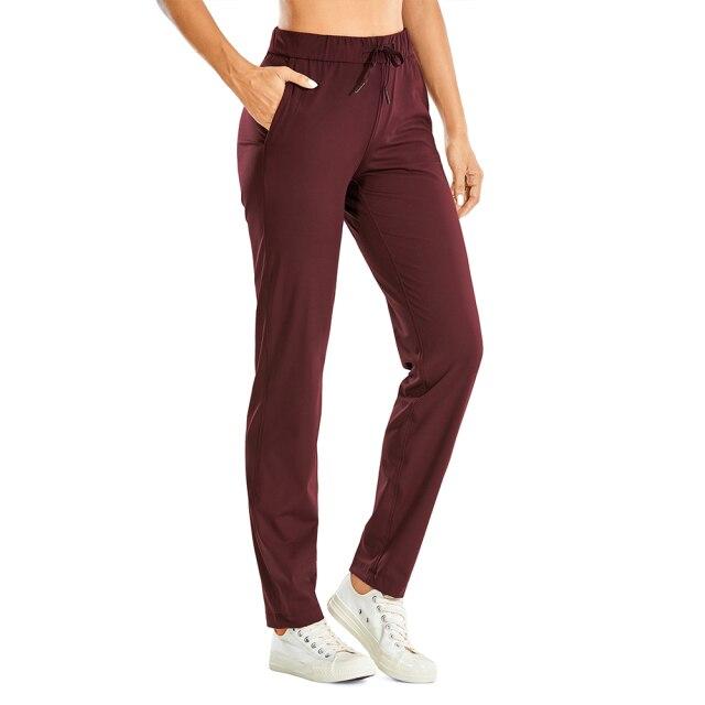 A pair of women's stretch lounge sweatpants in a stylish design, featuring a drawstring closure and pockets, perfect for travel and athletic training.