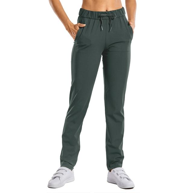 A pair of women's stretch lounge sweatpants in a stylish design, featuring a drawstring closure and pockets, perfect for travel and athletic training.