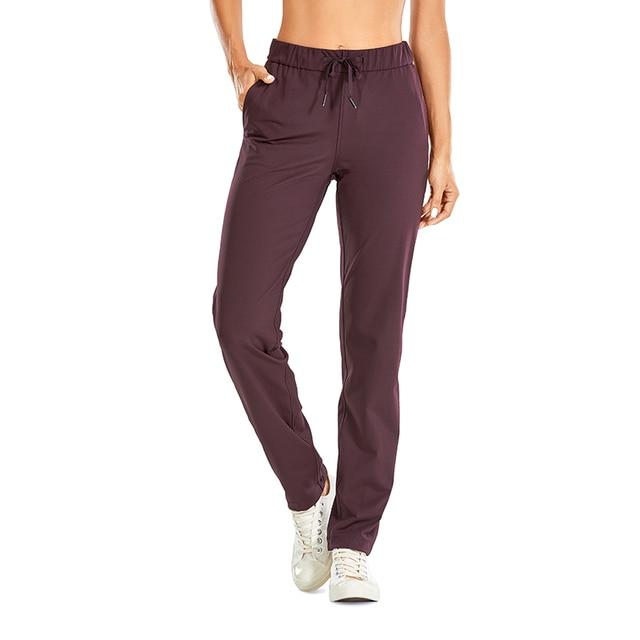 A pair of women's stretch lounge sweatpants in a stylish design, featuring a drawstring closure and pockets, perfect for travel and athletic training.