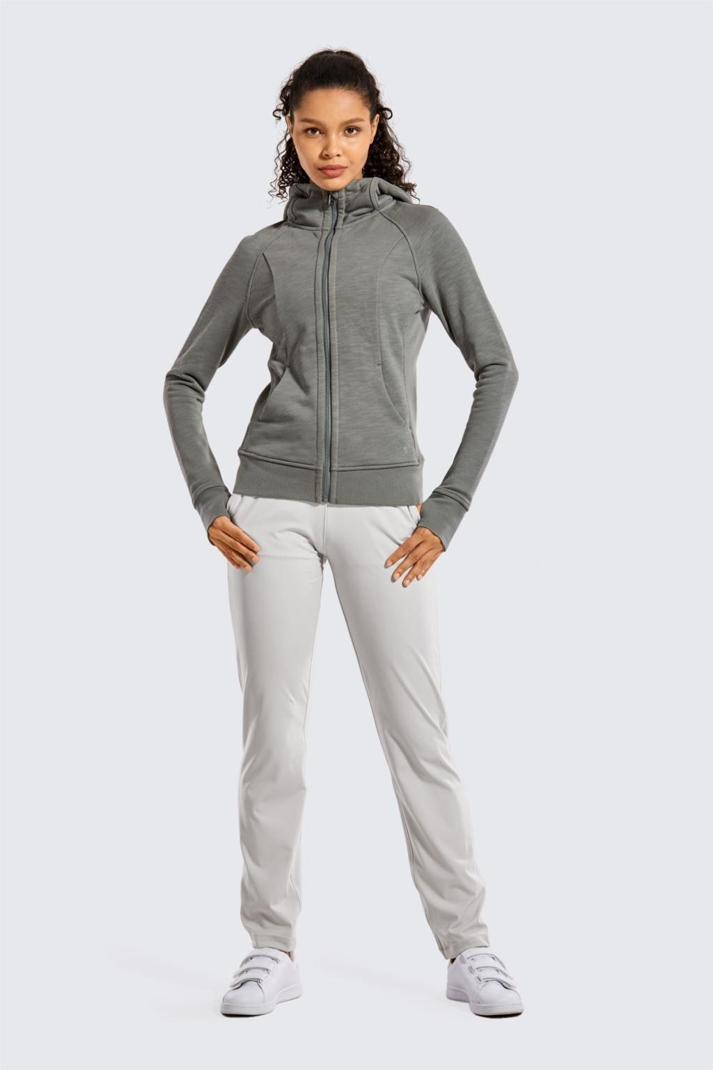 A pair of women's stretch lounge sweatpants in a stylish design, featuring a drawstring closure and pockets, perfect for travel and athletic training.