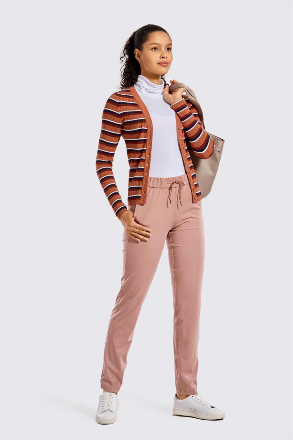 A pair of women's stretch lounge sweatpants in a stylish design, featuring a drawstring closure and pockets, perfect for travel and athletic training.