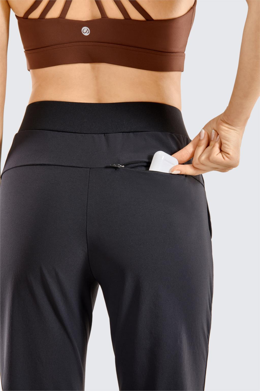 A pair of Women's Zip-off Hiking Pants in various colors, showcasing their lightweight and quick-drying fabric, with zip-off legs for versatility.