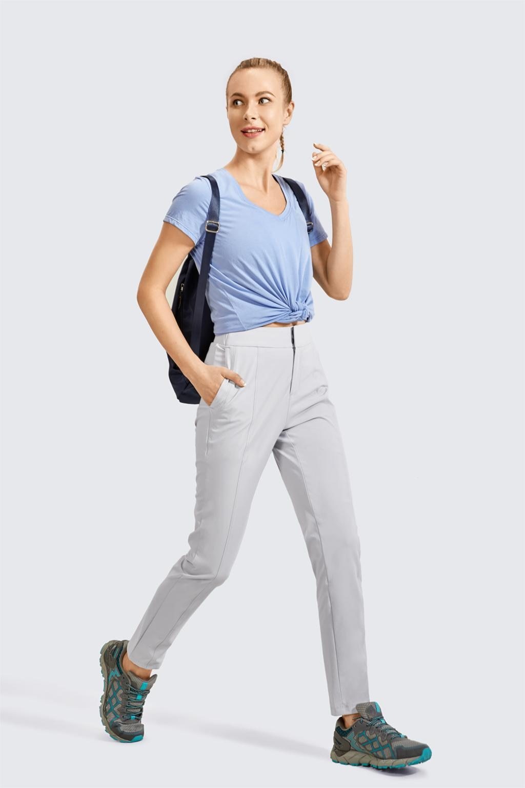 A pair of Women's Zip-off Hiking Pants in various colors, showcasing their lightweight and quick-drying fabric, with zip-off legs for versatility.