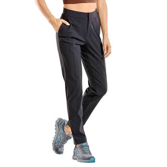 A pair of Women's Zip-off Hiking Pants in various colors, showcasing their lightweight and quick-drying fabric, with zip-off legs for versatility.