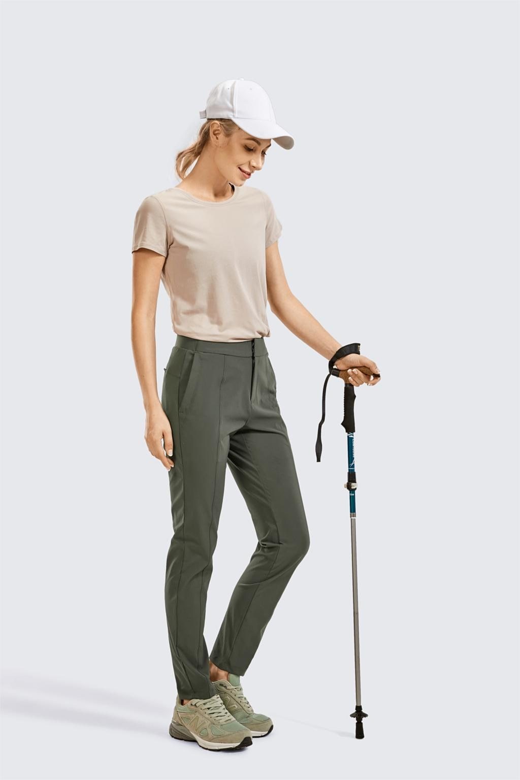 A pair of Women's Zip-off Hiking Pants in various colors, showcasing their lightweight and quick-drying fabric, with zip-off legs for versatility.