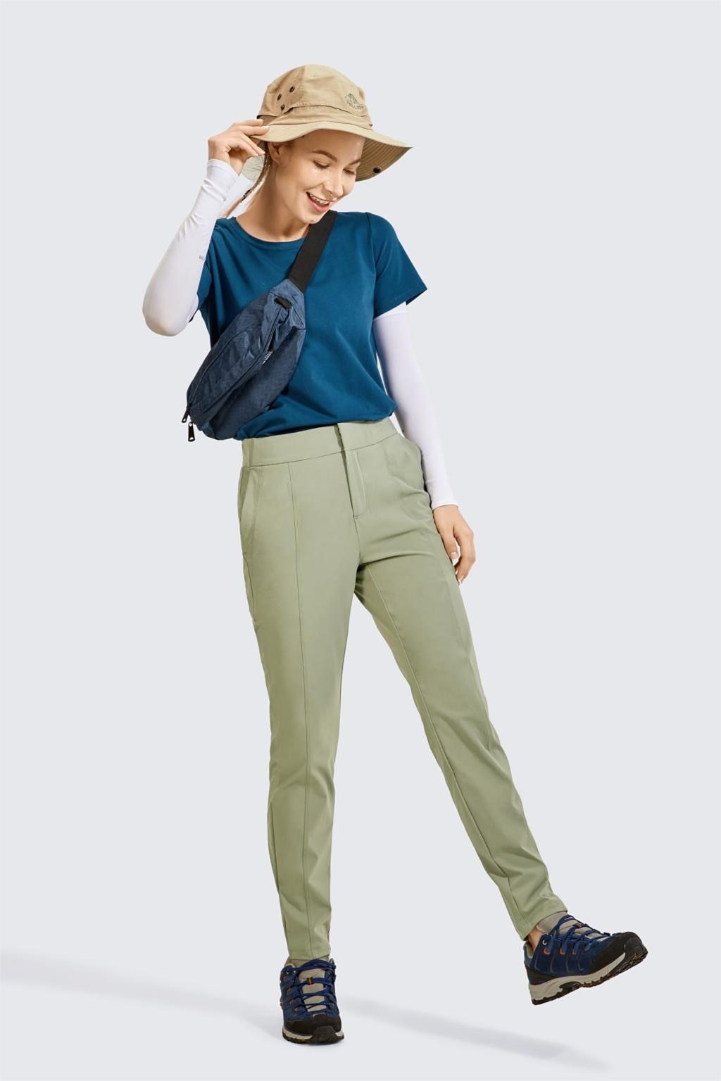 A pair of Women's Zip-off Hiking Pants in various colors, showcasing their lightweight and quick-drying fabric, with zip-off legs for versatility.