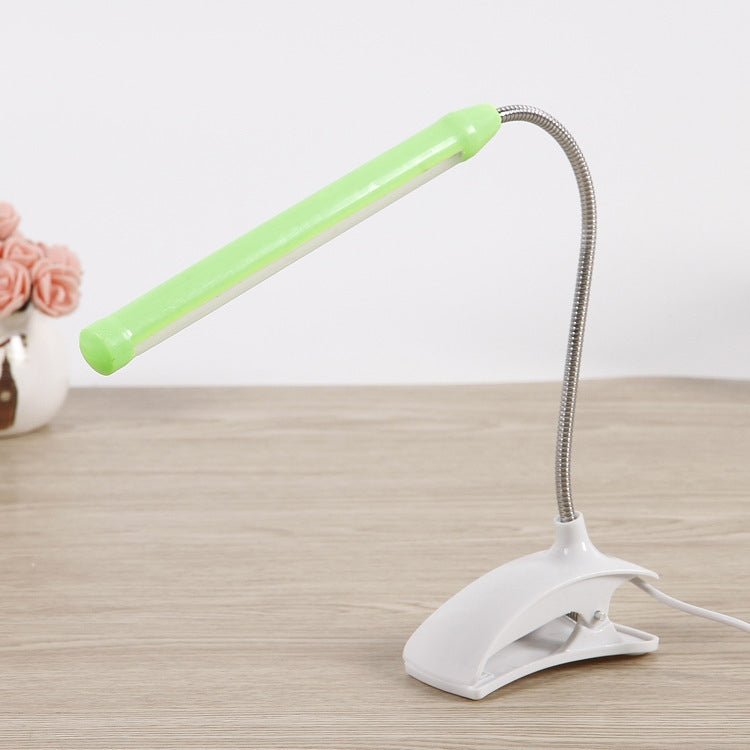 XL-013 USB Clip Learning Eye-care Desk Lamp with adjustable long tube and plastic base, designed for optimal lighting and eye comfort.