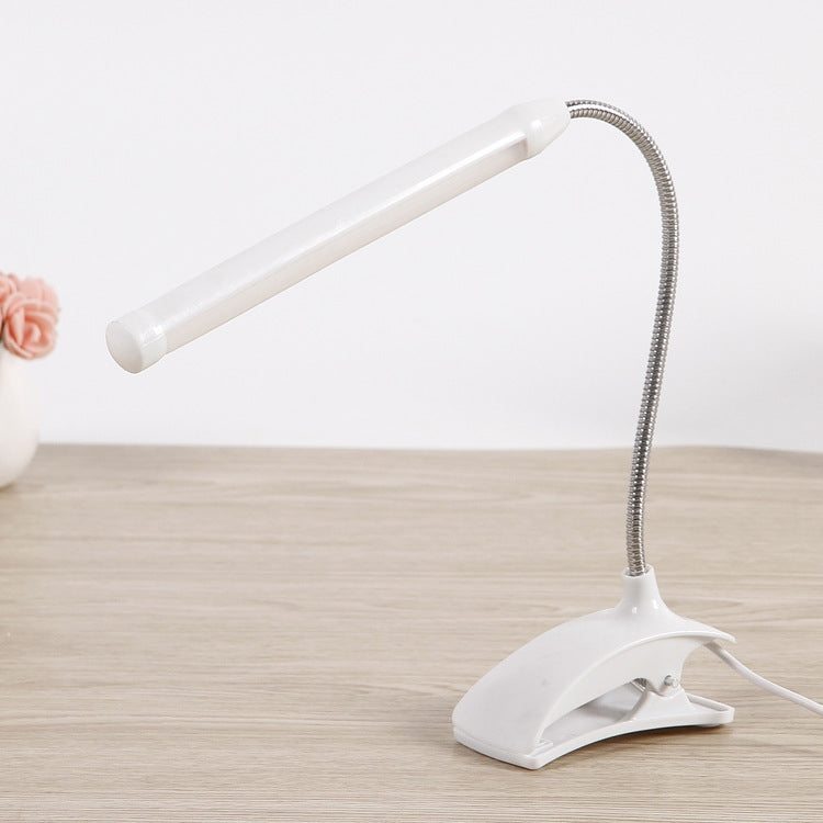 XL-013 USB Clip Learning Eye-care Desk Lamp with adjustable long tube and plastic base, designed for optimal lighting and eye care.