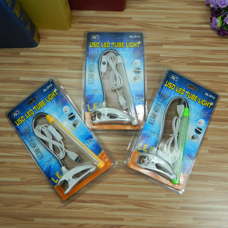 XL-013 USB Clip Learning Eye-care Desk Lamp with adjustable long tube and plastic base, designed for optimal lighting and eye care.