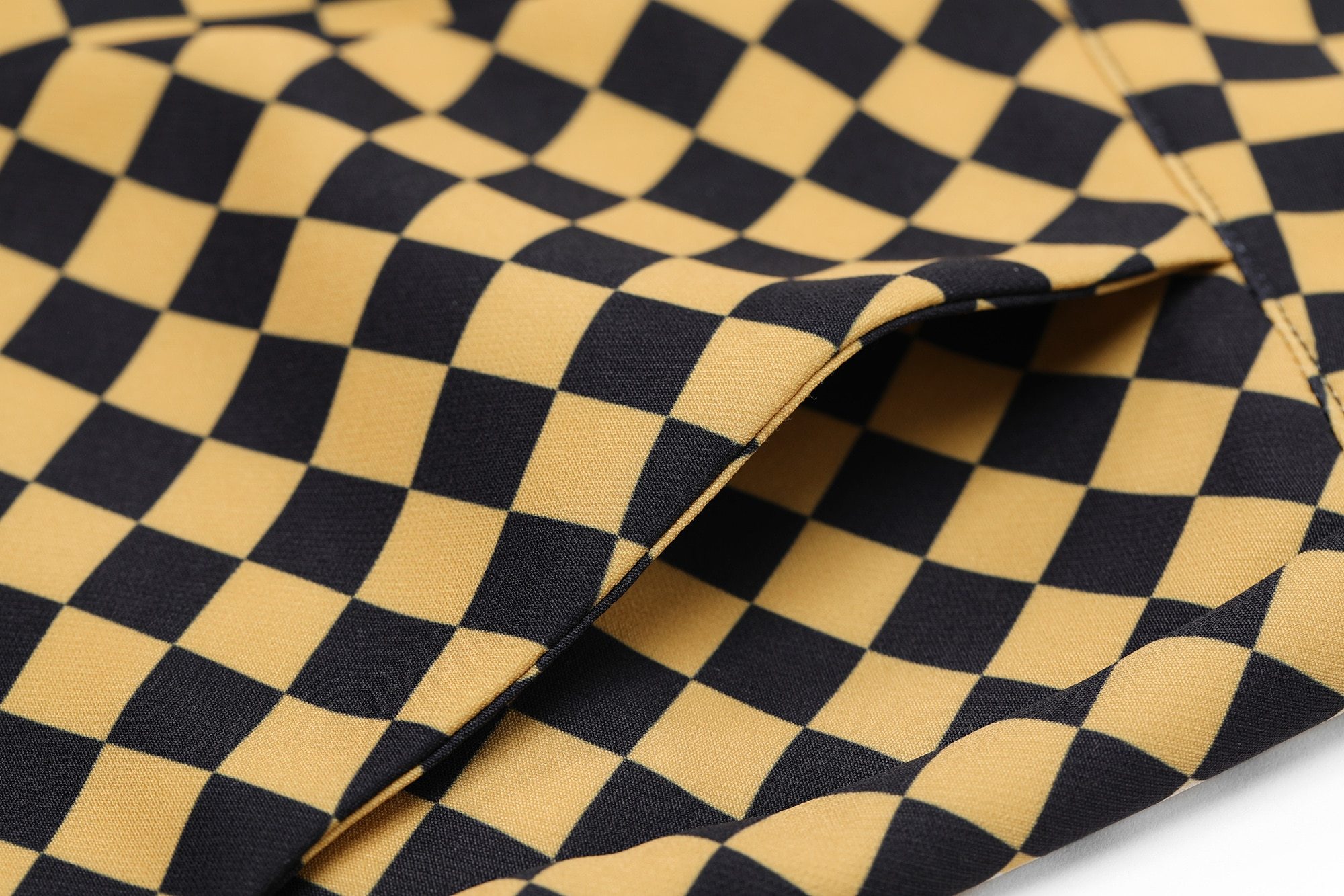 A pair of stylish yellow plaid high waist casual women flare pants, showcasing a chic design suitable for spring and autumn wear.