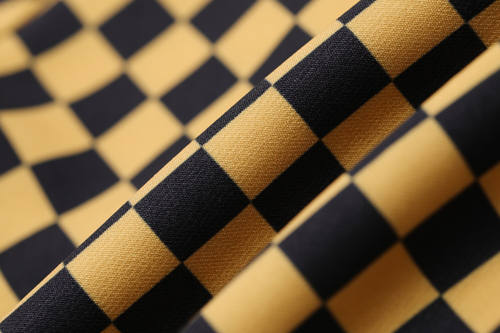 A pair of stylish yellow plaid high waist casual women flare pants, showcasing a chic design suitable for spring and autumn wear.