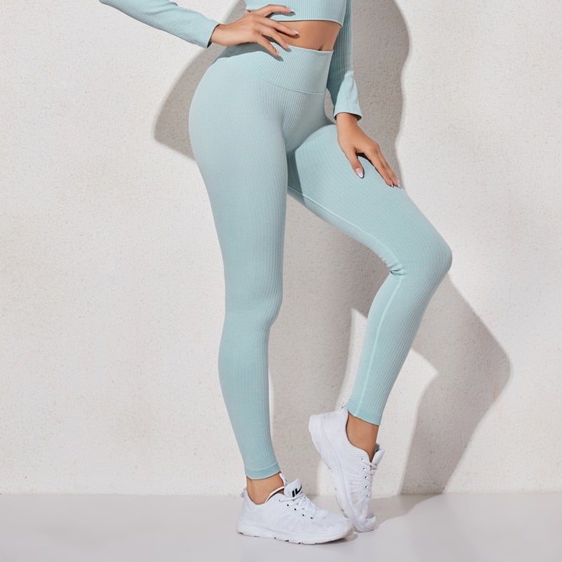 A pair of WAREBALL seamless yoga pants in various colors, showcasing the high waist design and ankle-length fit, ideal for women's activewear.