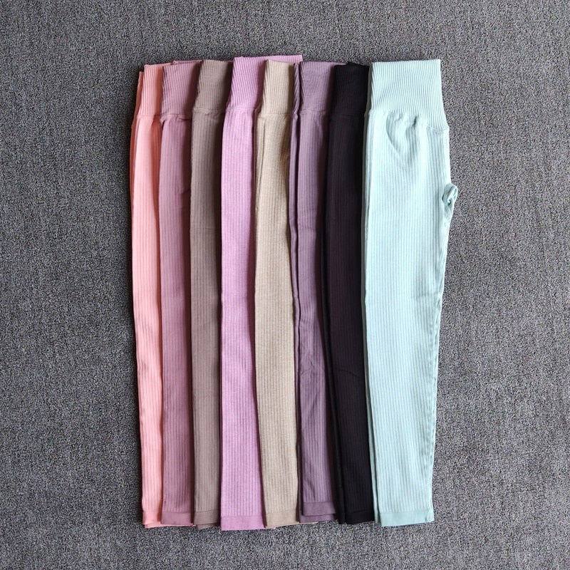 A pair of WAREBALL seamless yoga pants in various colors, showcasing the high waist design and ankle-length fit, ideal for women's activewear.