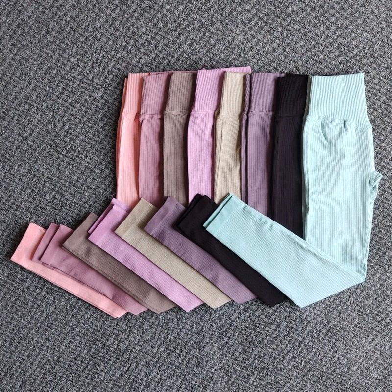 A pair of WAREBALL seamless yoga pants in various colors, showcasing the high waist design and ankle-length fit, ideal for women's activewear.