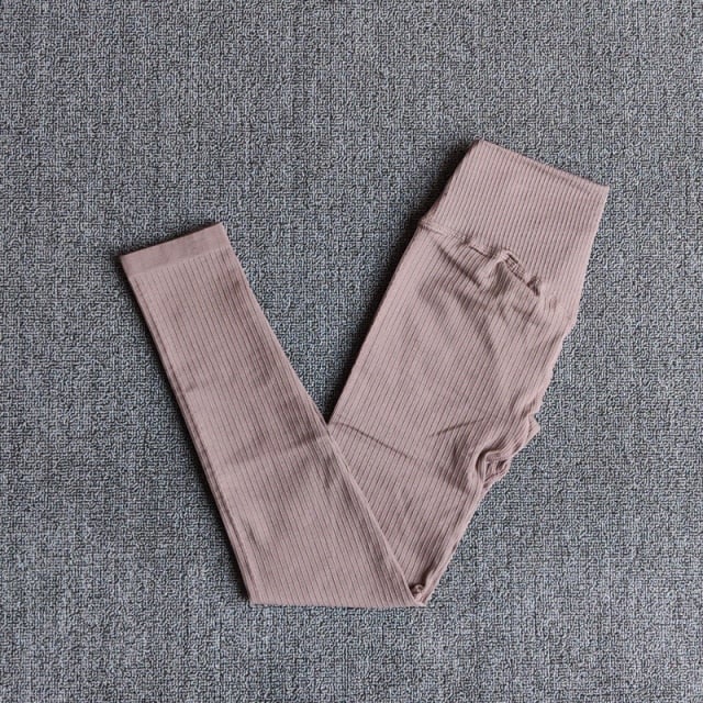 A pair of WAREBALL seamless yoga pants in various colors, showcasing the high waist design and ankle-length fit, ideal for women's activewear.