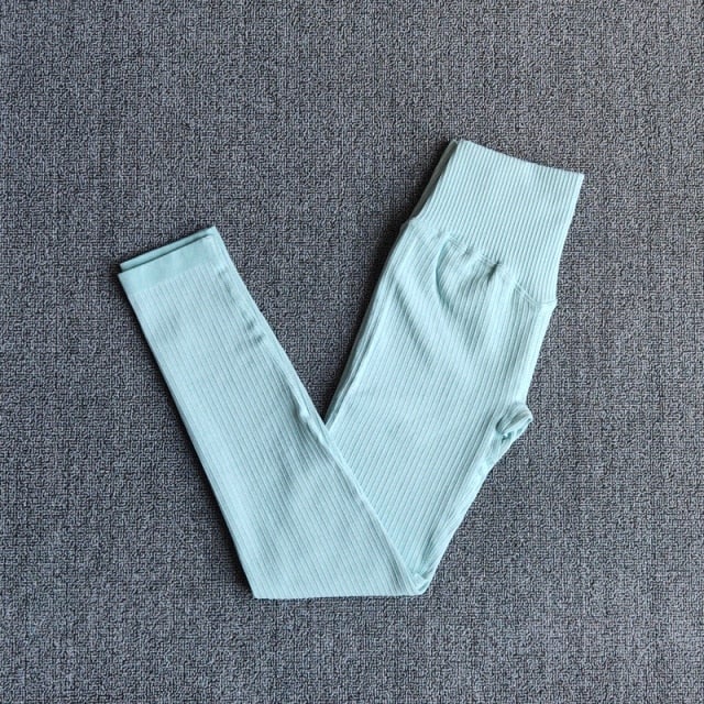 A pair of WAREBALL seamless yoga pants in various colors, showcasing the high waist design and ankle-length fit, ideal for women's activewear.