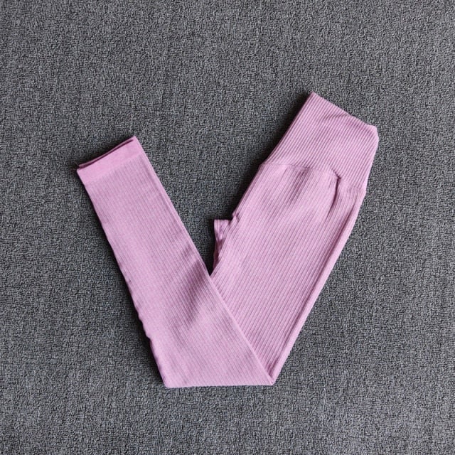 A pair of WAREBALL seamless yoga pants in various colors, showcasing the high waist design and ankle-length fit, ideal for women's activewear.