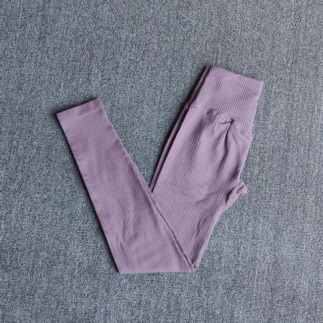A pair of WAREBALL seamless yoga pants in various colors, showcasing the high waist design and ankle-length fit, ideal for women's activewear.
