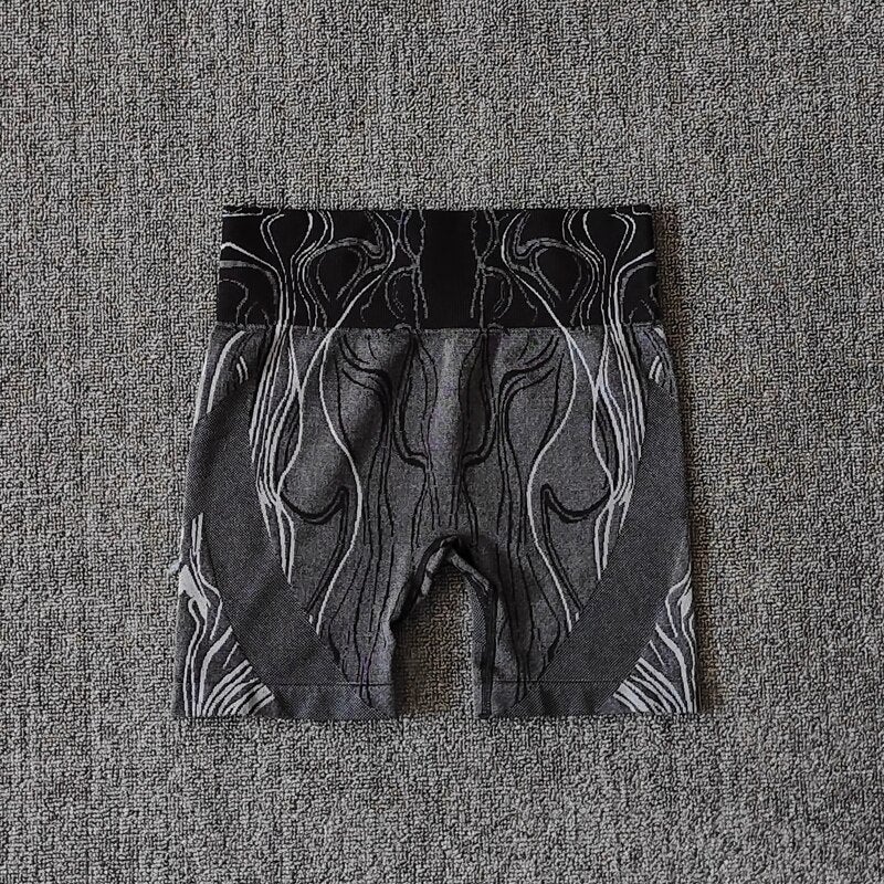 High waist push up sports shorts for women in black, pink, and blue, designed for yoga, cycling, and running.