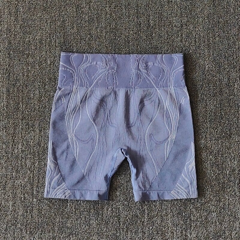 High waist push up sports shorts for women in black, pink, and blue, designed for yoga, cycling, and running.