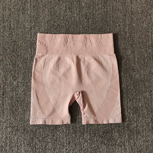 High waist push up sports shorts for women in black, pink, and blue, designed for yoga, cycling, and running.