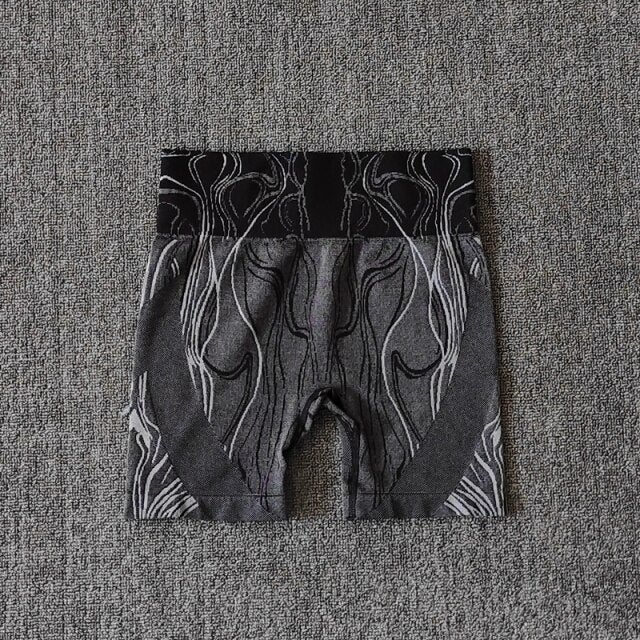 High waist push up sports shorts for women in black, pink, and blue, designed for yoga, cycling, and running.