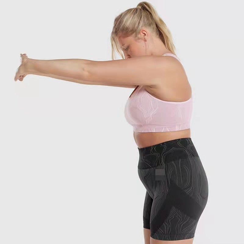 High waist push up sports shorts for women in black, pink, and blue, designed for yoga, cycling, and running.