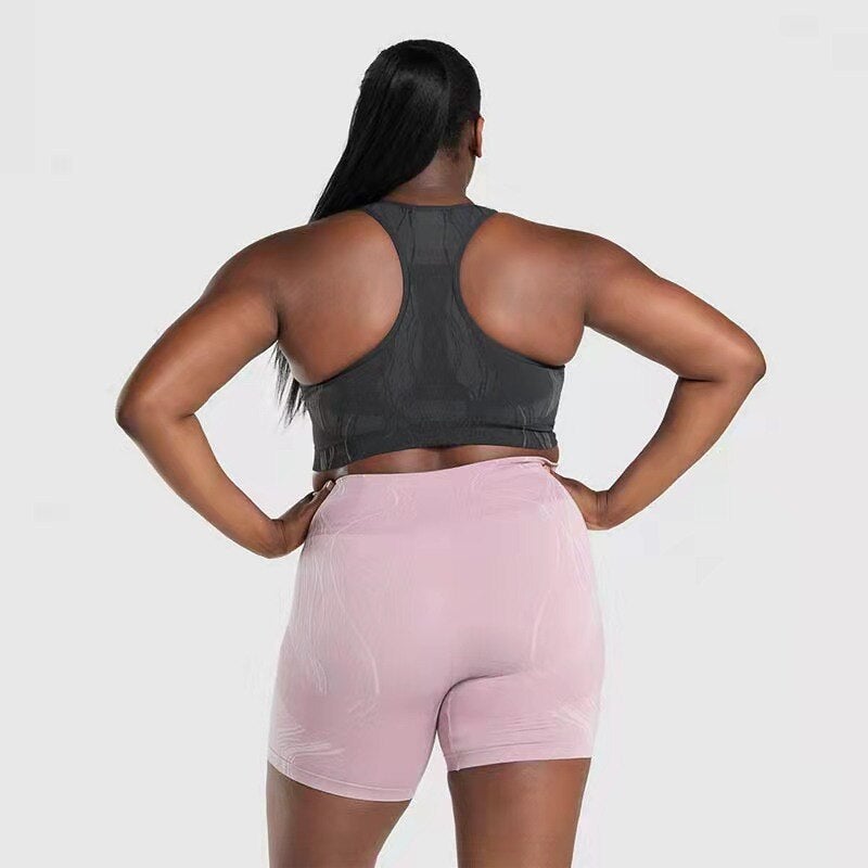 High waist push up sports shorts for women in black, pink, and blue, designed for yoga, cycling, and running.