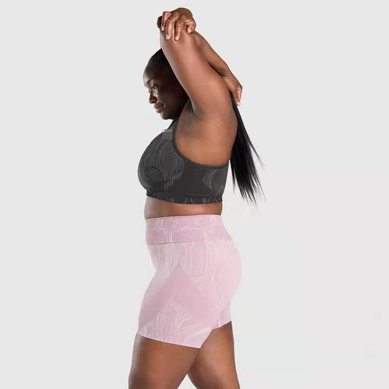 High waist push up sports shorts for women in black, pink, and blue, designed for yoga, cycling, and running.