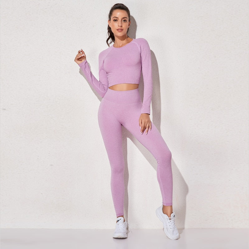 Women's seamless long sleeve yoga crop top in various colors, designed for fitness and comfort during workouts.