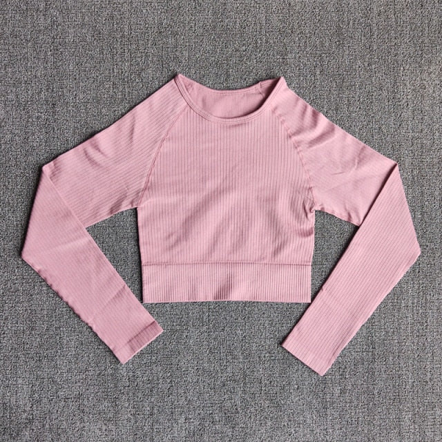 Women's seamless long sleeve yoga crop top in various colors, designed for fitness and comfort during workouts.