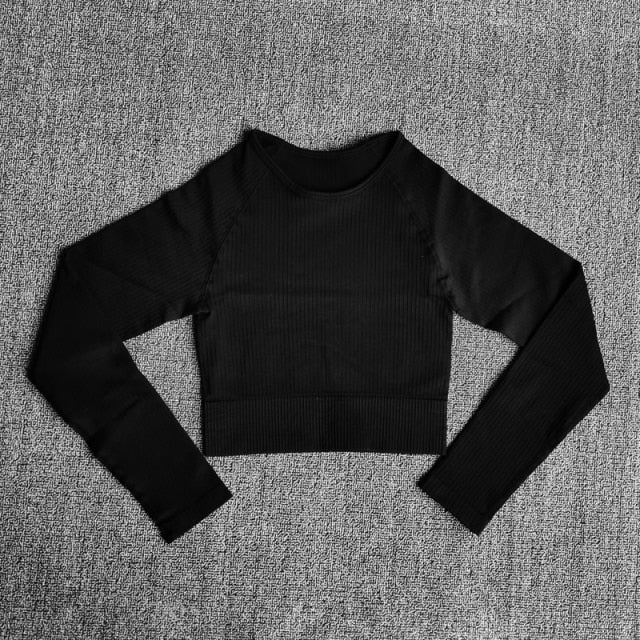 Women's seamless long sleeve yoga crop top in various colors, designed for fitness and comfort during workouts.
