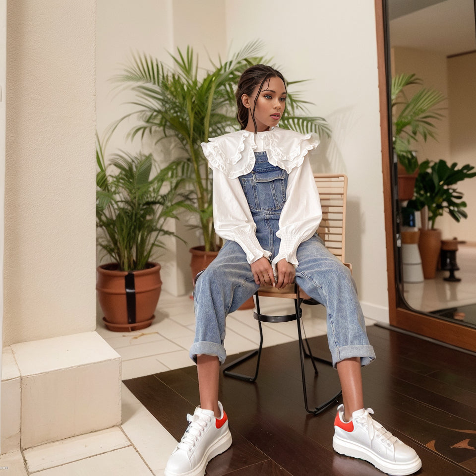 Young Autumn Korean Style Loose Cropped Denim Suspender Pants displayed on a mannequin, showcasing the trendy suspender design and loose fit.