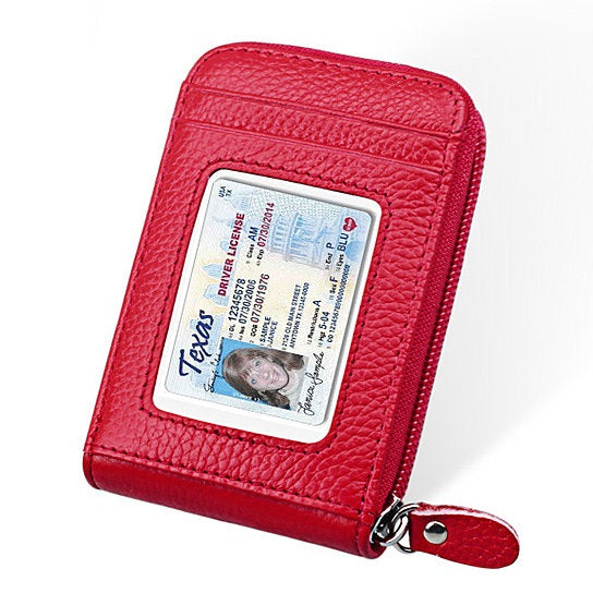 Zip Vault RFID Blocker Card Holder and Wallet in various colors, showcasing its sleek design and transparent ID window.