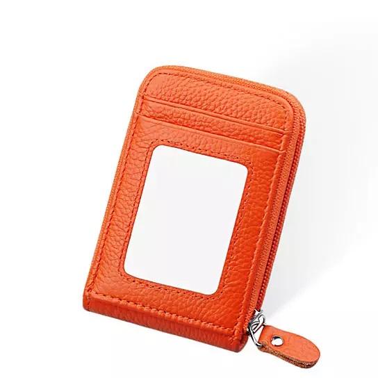 Zip Vault RFID Blocker Card Holder and Wallet in various colors, showcasing its sleek design and transparent ID window.