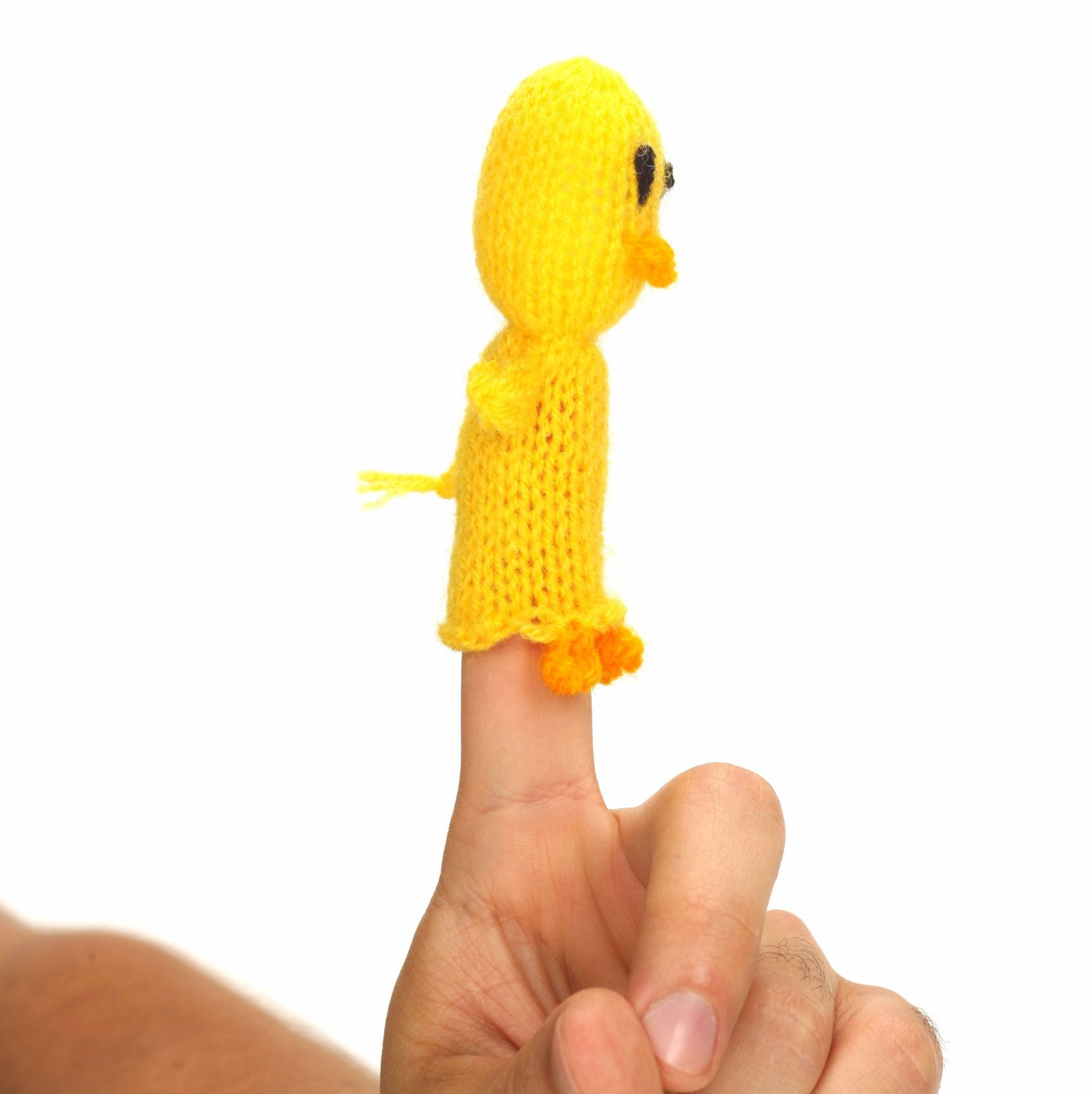 A colorful Baby Chick Finger Puppet handcrafted by Peruvian artisans, showcasing unique designs and eco-friendly materials.