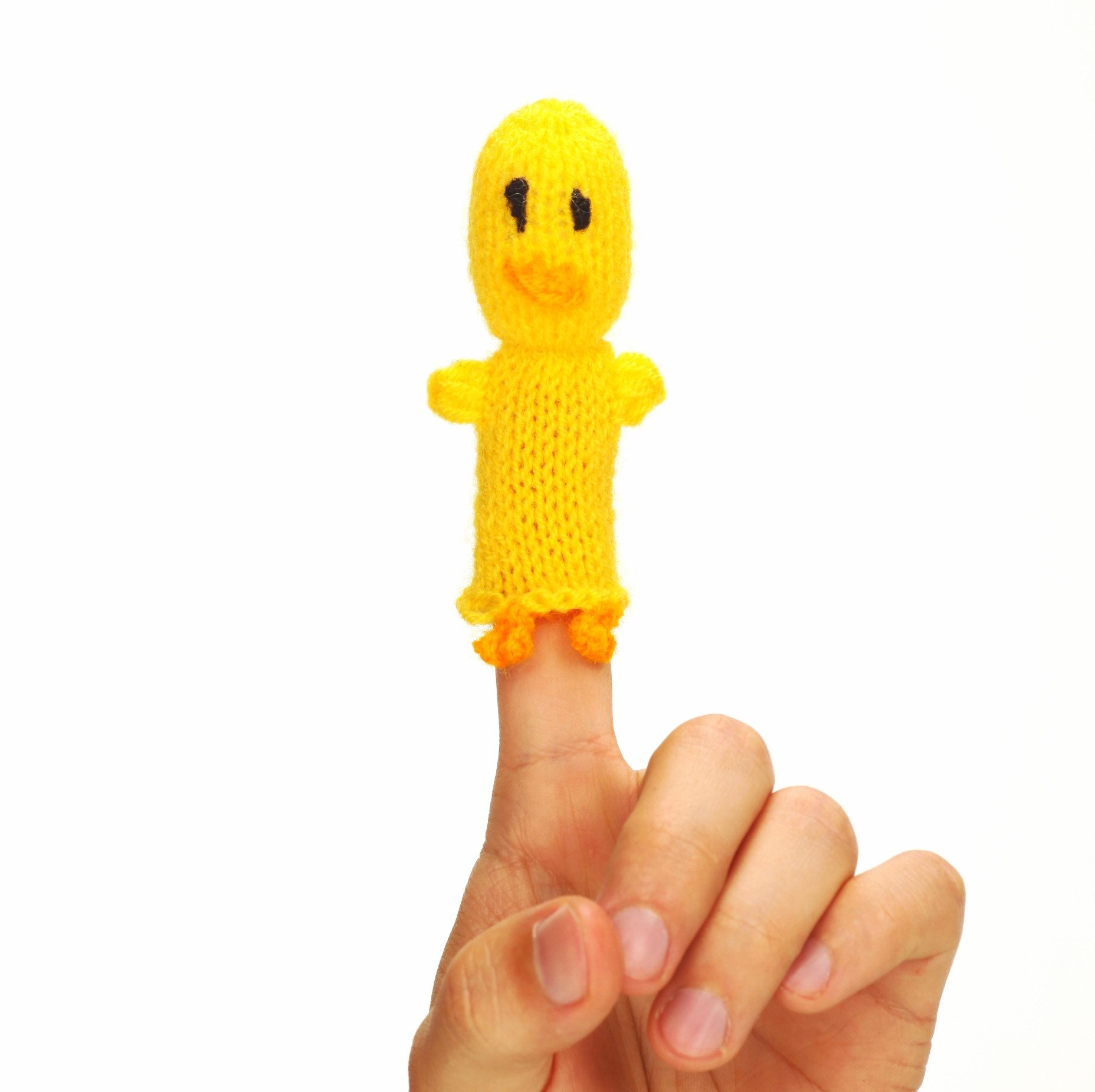 A colorful Baby Chick Finger Puppet handcrafted by Peruvian artisans, showcasing unique designs and eco-friendly materials.