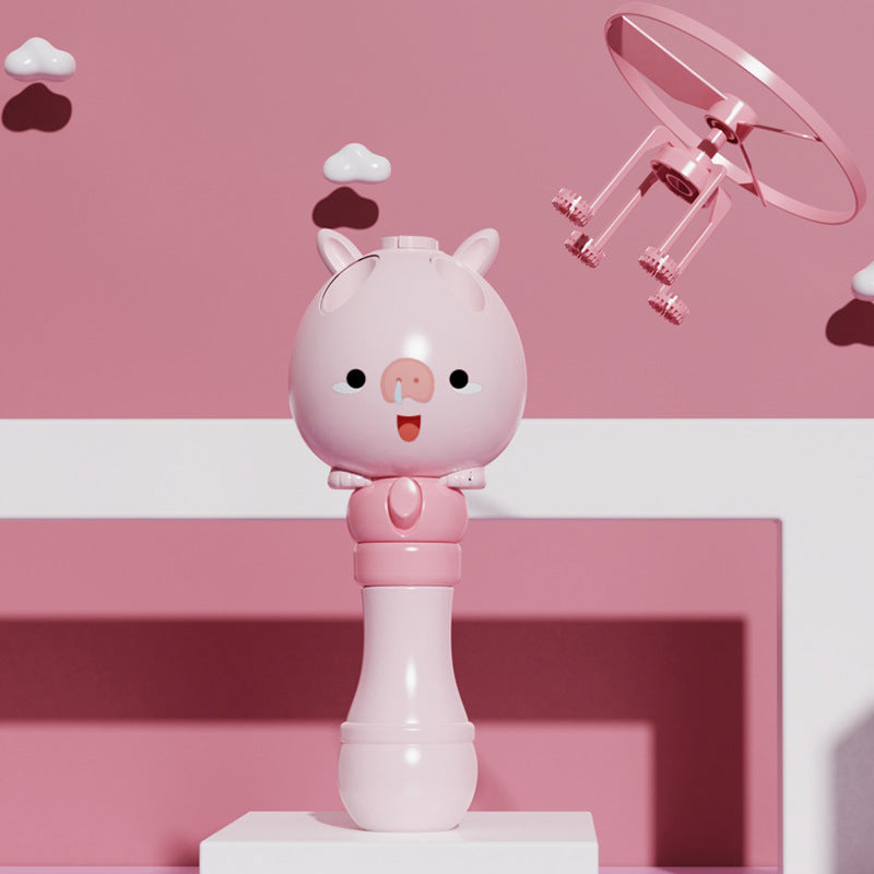 Bamboo Dragonfly Rotating Flying Bubble Machine with colorful bubbles and music, designed for outdoor play for children.