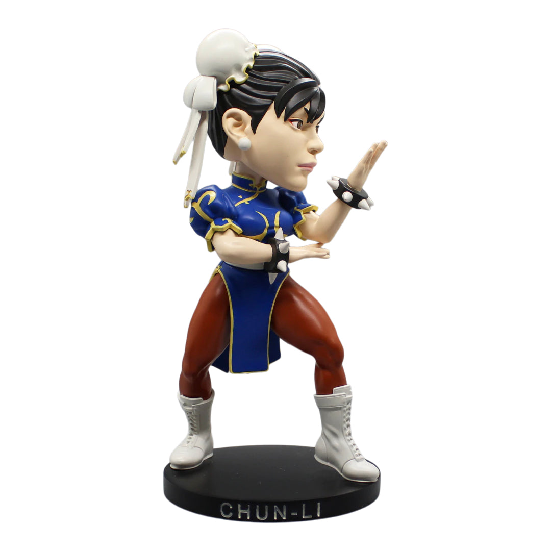 Capcom Street Fighter Chun-Li bobblehead, 8 inches tall, hand-painted polystone figure on a colorful base.