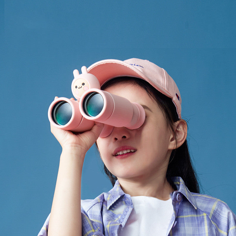 Children's binoculars telescope in pink and blue, featuring adjustable lenses and independent focusing wheels, designed for young explorers.