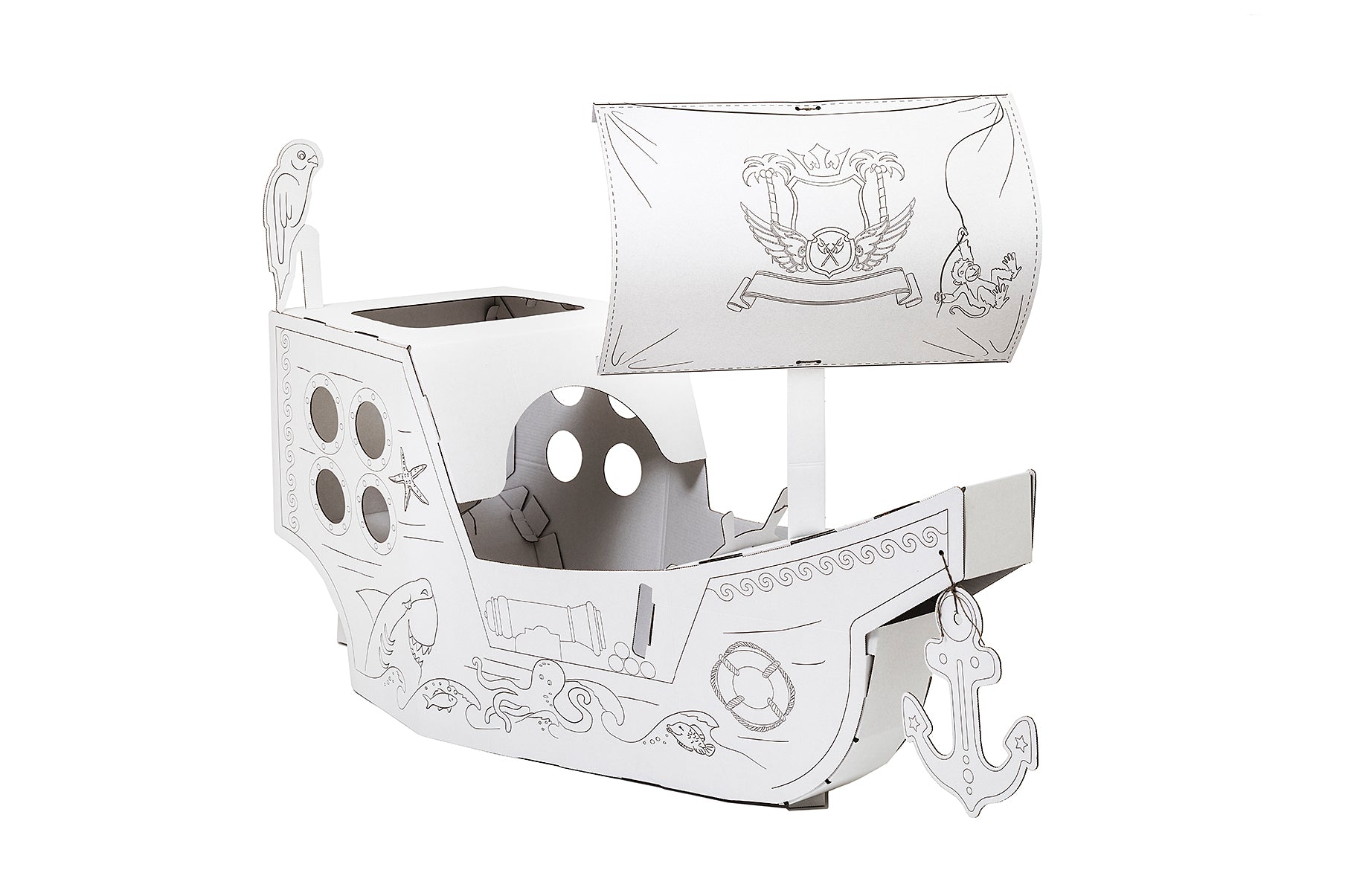 A large DIY cardboard pirate ship for kids, featuring a steering wheel, anchor, and cabin, ready for imaginative play.