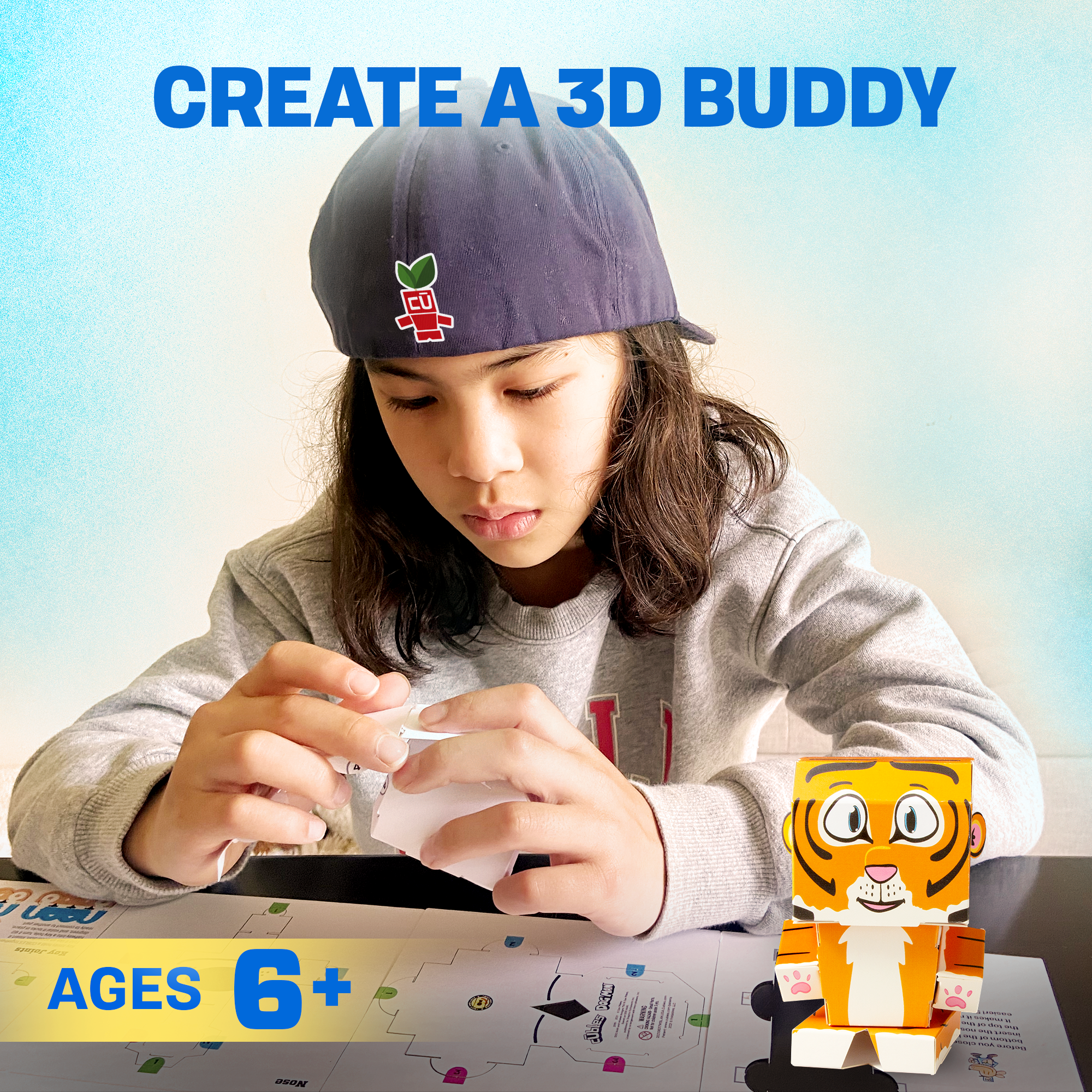 CUBLES Tiger paper craft kit featuring poseable character pieces in vibrant colors, designed for children aged 6 and up.